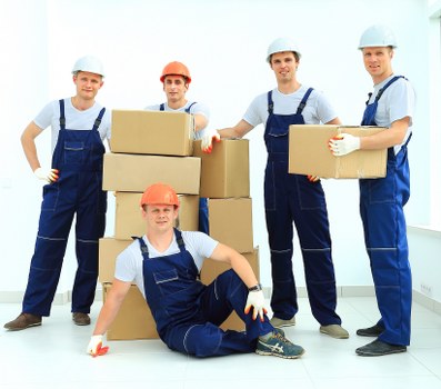 Packed boxes and household items prepared for a Hampstead removal van