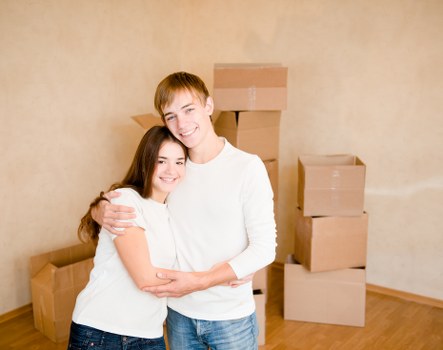 Furniture removals team handling large household items in a Hampstead home