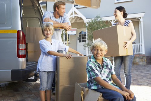 Packing and loading furniture into a moving truck in Hampstead